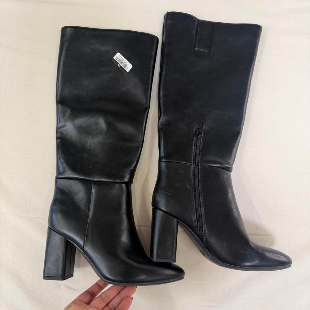 Chic black knee-high boots